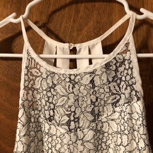 Pretty summer top size large fits like a medium.